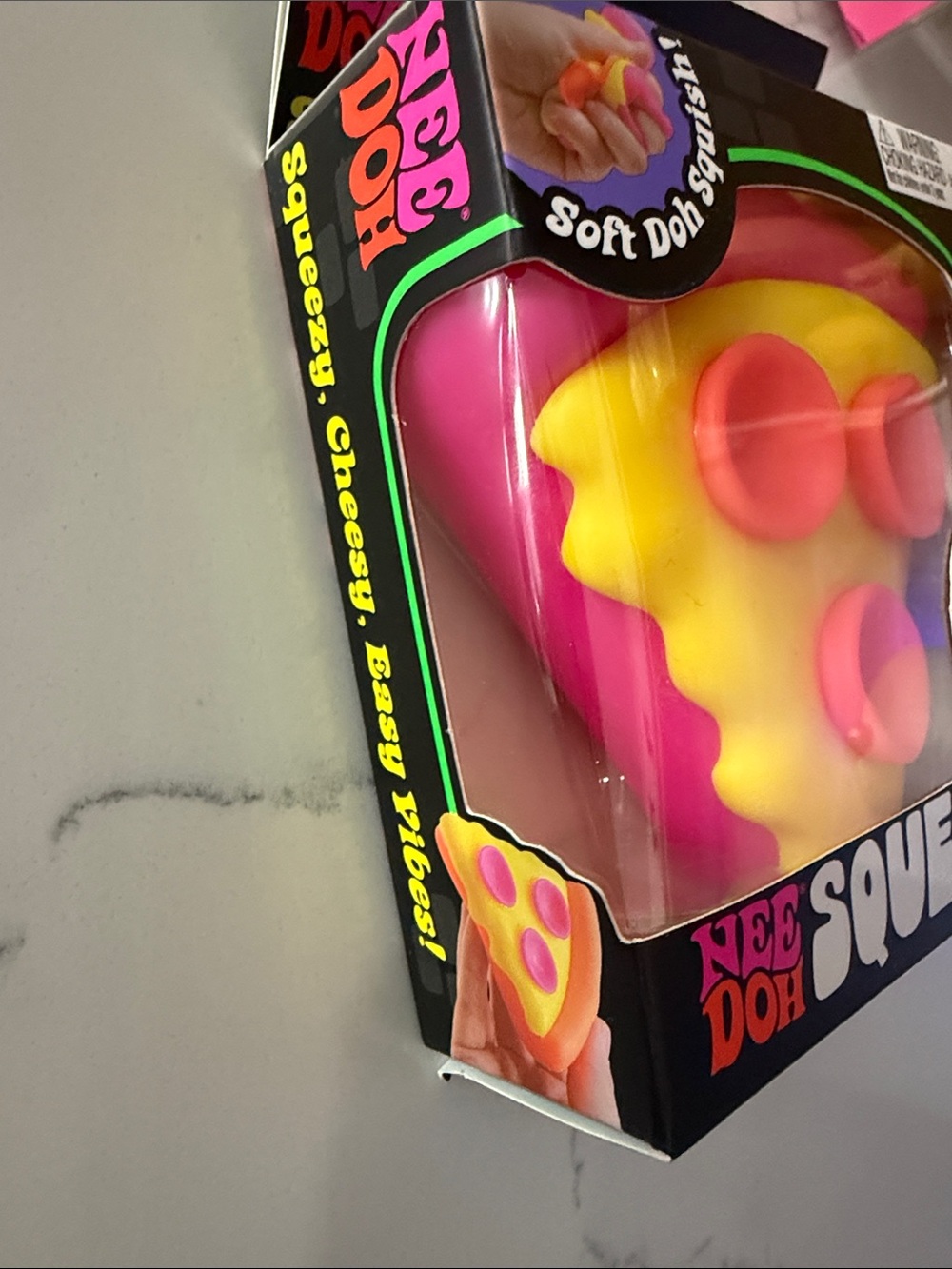 Authentic NeeDoh Squeezza Soft Doh Pizza Slice Squishy Toy - Yellow & Pink - Picture 3 of 3